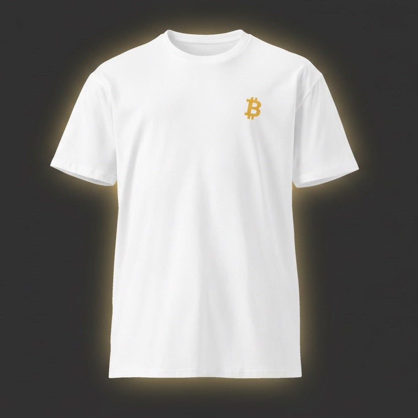 White t-shirt with a gold Bitcoin symbol on a dark background