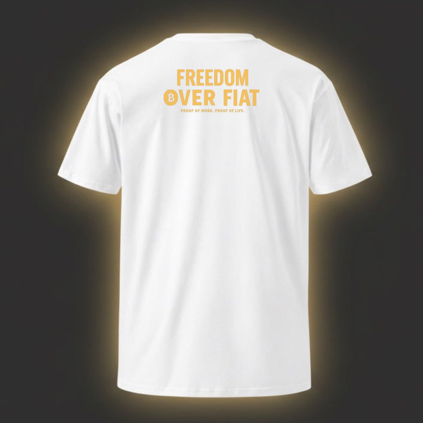 White t-shirt with 'Freedom Over Fiat' text on the back against a dark background