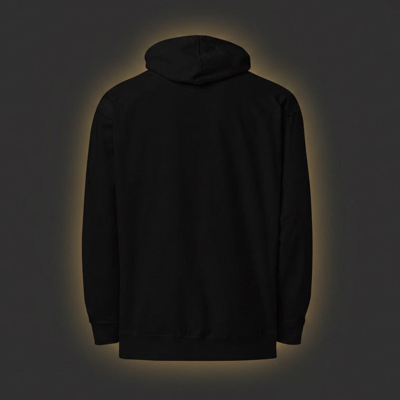 Black hoodie with a glowing outline on a dark background