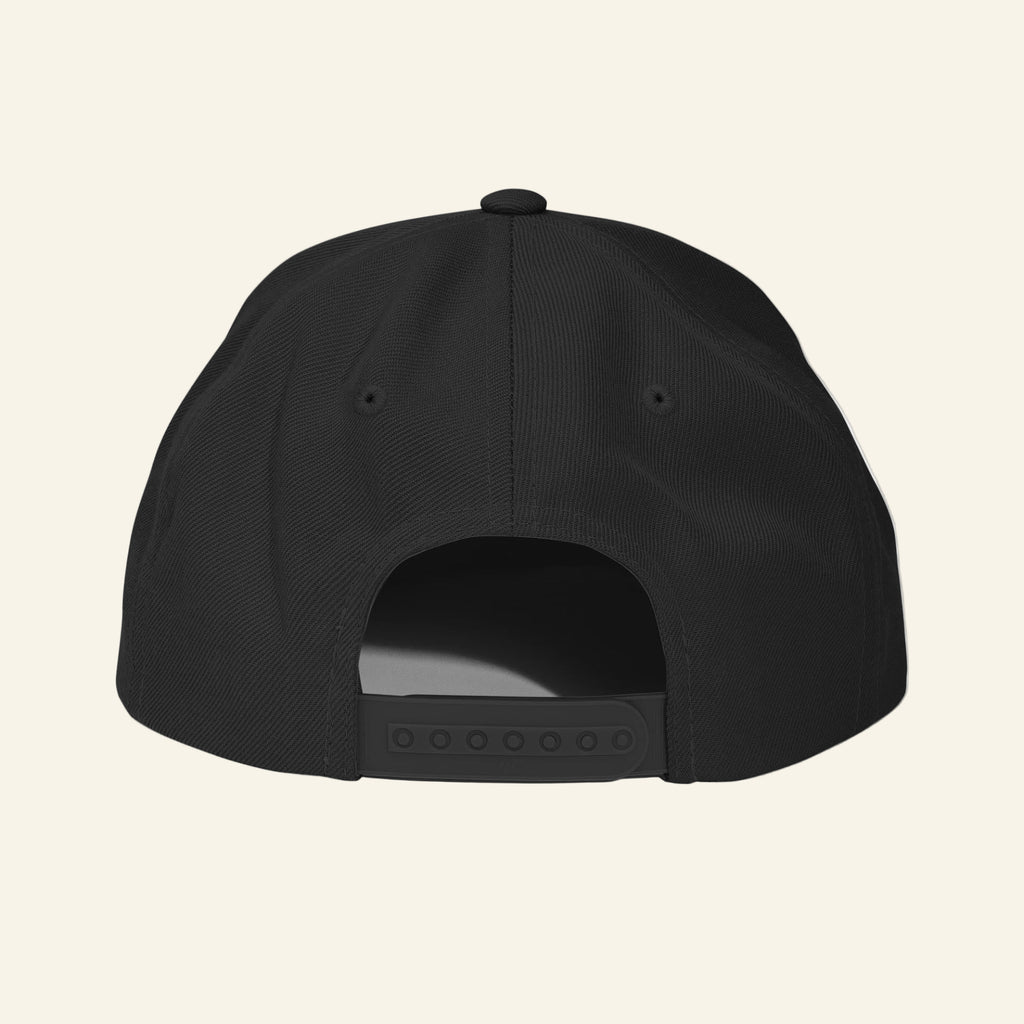 Black cap on a beige background