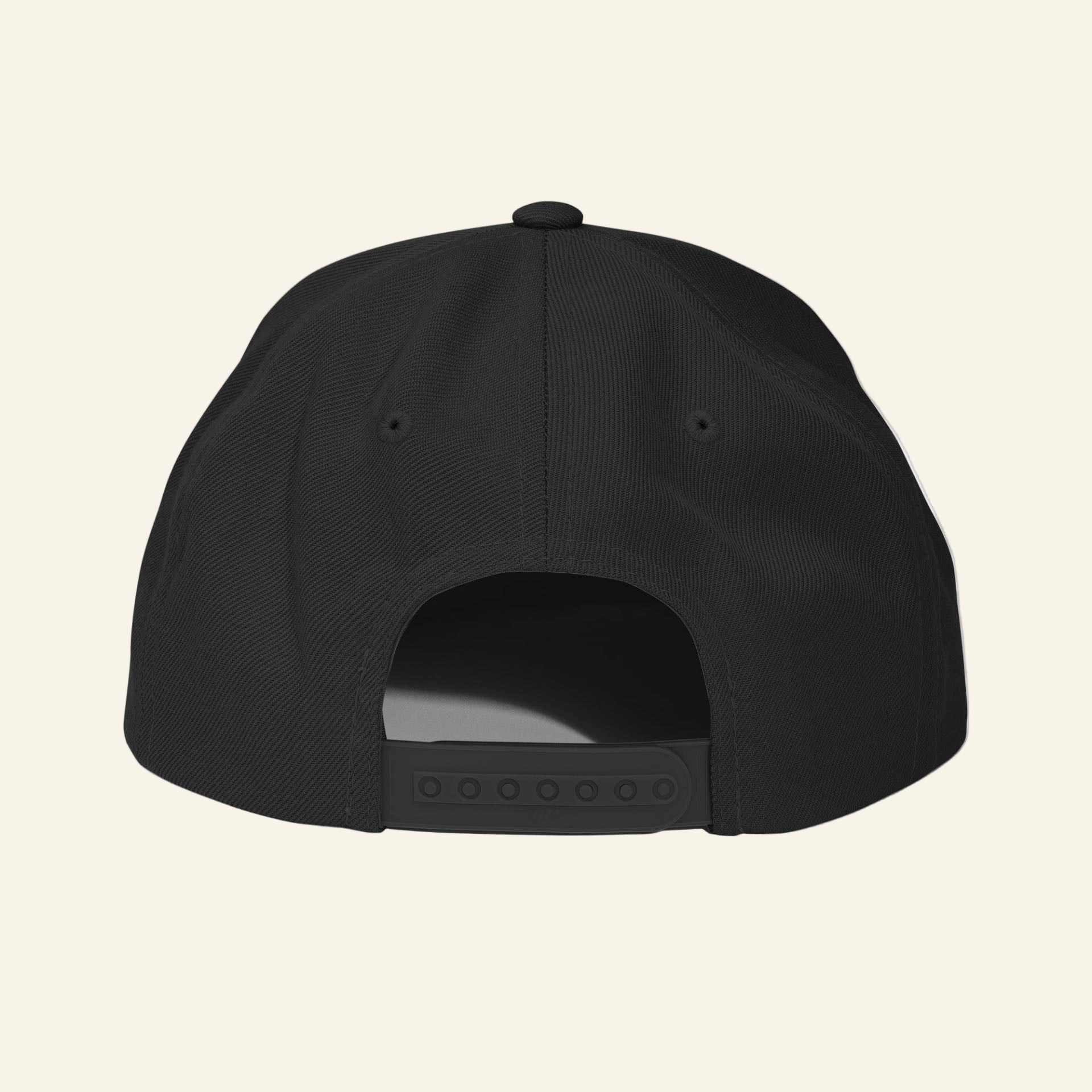 Black cap on a beige background