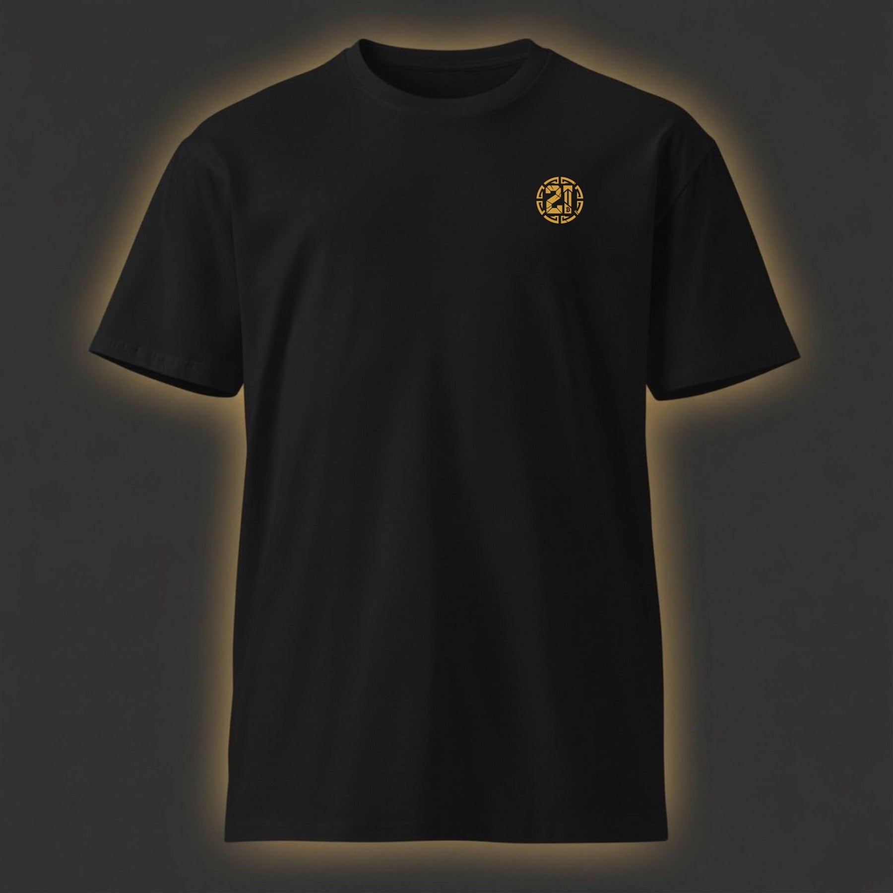 Black t-shirt with a gold logo on a dark background